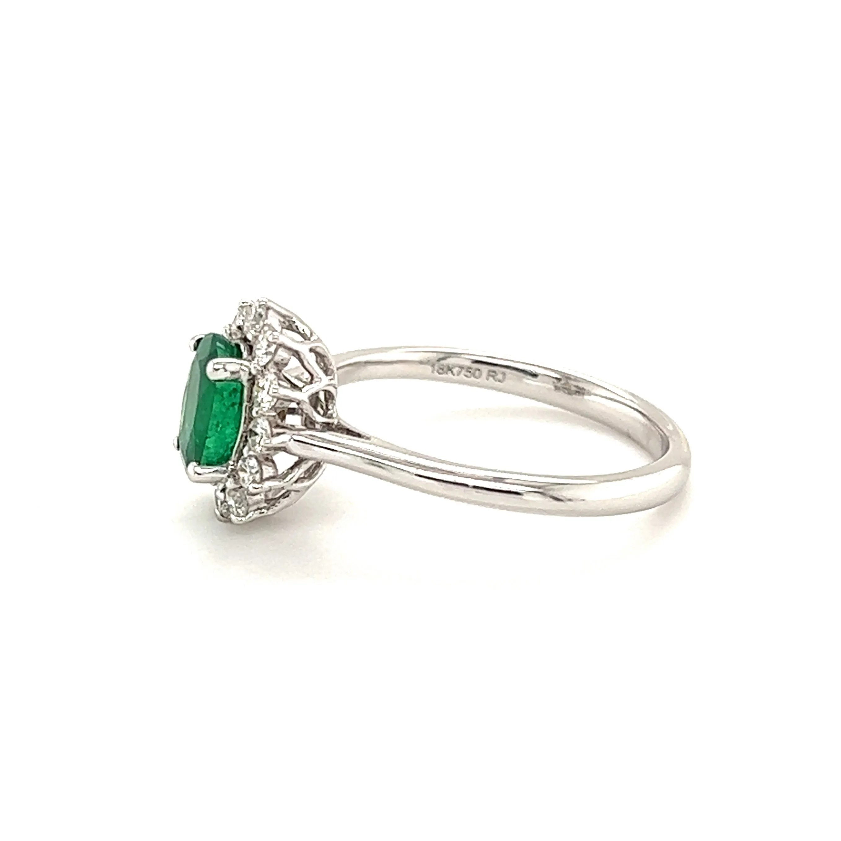 Oval Emerald Ring with Floral Diamond Halo in 18K White Gold