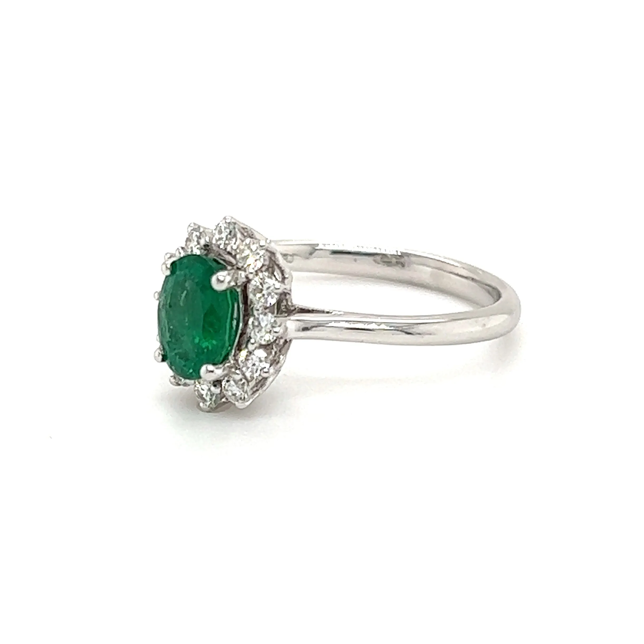 Oval Emerald Ring with Floral Diamond Halo in 18K White Gold